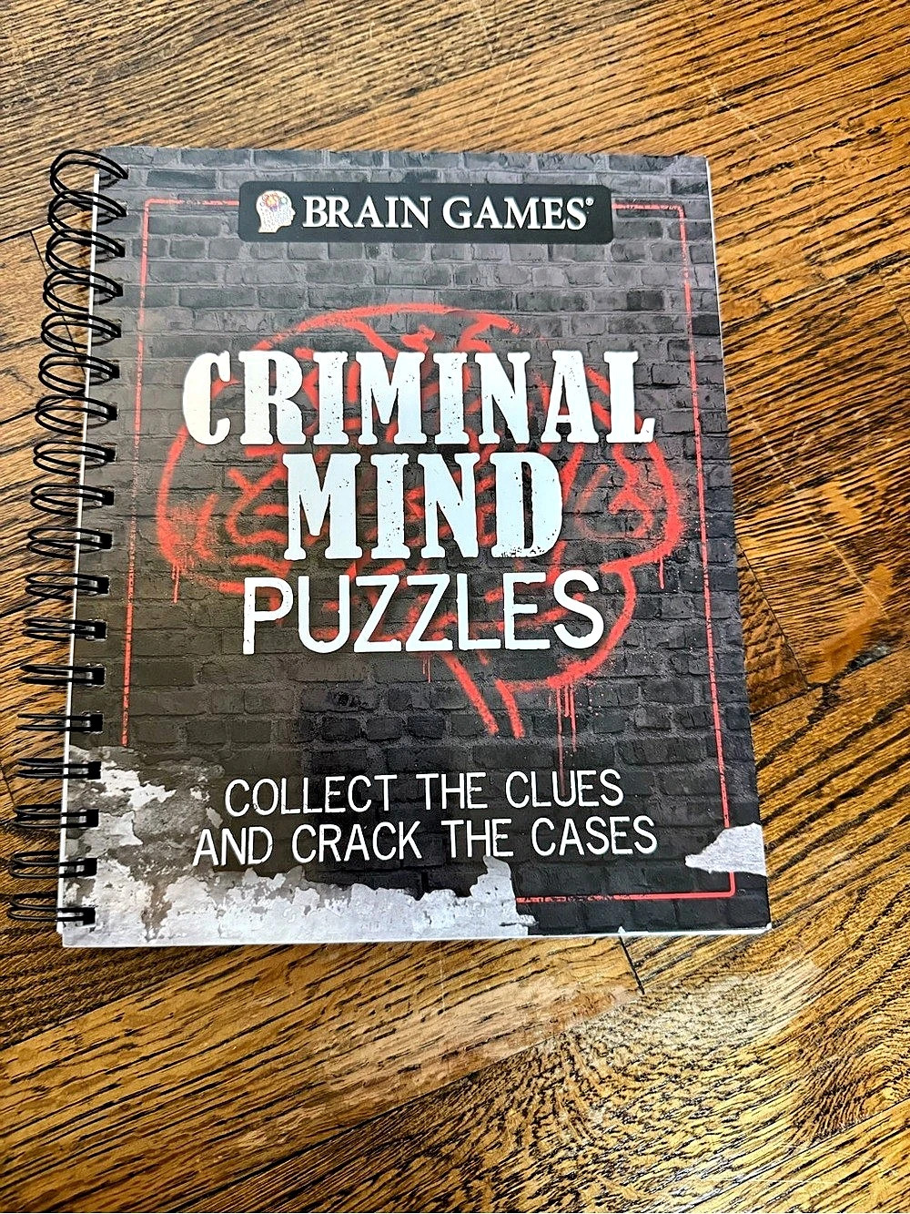 Brain Games Criminal Mind Puzzles Spiral Puzzle Book Black & Red